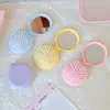 Color Macarrón Plegable Bolsa de Aire Peine Peine Masajeador Espejo Integrado Portátil Mini Peine de Cojín de Aire Peine Pequeño para Niñas