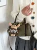 Bolso de mano de ante de nicho coreano para mujer, nuevo bolso de hombro para el día a día 2026, bolso versátil y elegante para el antebrazo