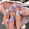 Manicura de uñas postizas con ojos plateados misteriosos, tótem azul y blanco ovalado corto, estilo europeo y americano, pieza de uña dulce y genial.