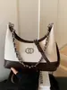 Bolso de mano pequeño de moda para mujer, nuevo bolso de cadena popular primavera-verano 2026, exquisito bolso de hombro y cruzado