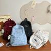 Mochila Escolar para Estudiantes de Secundaria y Preparatoria Transfronteriza, Nueva Moda, Textil para Vestir, Estilo Japonés, Mochila de Color Sólido, Ligera, de Gran Capacidad