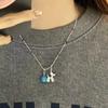 Collar de pájaro azul de otoño e invierno "Colección de poesía de aves". Diseño retro con un bonito nicho, hecho a mano, cadena de lana a juego.