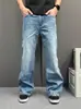Jeans retro acampanados de línea dividida azul para hombre, adecuados para el uso diario y para ir al trabajo, con un diseño holgado, de pierna recta, ligeramente ancho y fluido, un par de pantalones de moda