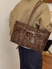 Moda Outono Inverno Bolsa Versátil Feminina 2026 Nova Casual Retro Camurça Pelúcia Bolsa de Ombro Único Bolsa Tote para o Trabalho sob o Braço