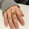Anillo de Acero de Titanio Rosa Ojo de Gato de Lujo Ligero Europeo y Americano Anillo Abierto de Alta Gama INS Joyería de Acero Inoxidable Al por Mayor