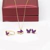 CDD nuevo color Trébol conjunto de tres piezas collar de mariposa de doble cara pendientes de botón anillo traje femenino comercio exterior en stock al por mayor