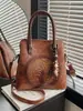 Bolso de Mano de Estilo Étnico Transfronterizo de Nicho Retro para Mujer 2026 Nuevo Bolso Cubo de Textura de Alta Calidad Bolso de Hombro Cruzado
