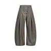 Diseño de botón diagonal sentido de la moda pantalones de pierna curva para hombre sueltos de pierna ancha traje pantalones largos cleanfit personalidad color liso pantalones casuales