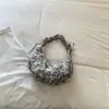 Bolsa de Bolinho Estampa de Leopardo Moda Retrô Outono 2026 Nova Bolsa Leve de Axila Sensação Preguiçosa Relaxada Bolsa de Ombro Único Transversal
