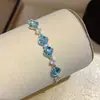 Pulsera Geométrica de Flor Azul Tono Azul Zircón, Diseño de Nicho, Estilo Minimalista, Joyería de Alta Gama