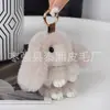 Pingente fofo de coelho fingindo estar morto, imitação de pelo de coelho Rex, chaveiro de carro, pingente de bolsa, pingente de coelhinho, pingente de casal