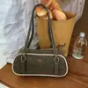 Bolso tipo almohada transfronterizo simple y moderno para mujer, bolso de hombro retro de color contrastante para otoño e invierno, bolso de hombro para commuting, bolso de alta gama