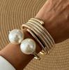Europa y Estados Unidos joyería transfronteriza moda perla pulsera de rebote multicapa aleación de alto nivel Traje de pulseras nuevo