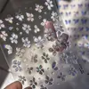 Adesivo para unhas flor de cerejeira 2025 novo cristal sonho flor adesivo relevo 3d luz de concha adesivo para unhas