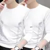 Camiseta de manga larga para hombre para primavera y otoño, disponible en blanco puro y negro, con cuello redondo, adecuada como capa base o camiseta interior, y un diseño fino y ligero para usar en otoño