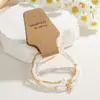Moda transfronteriza estilo simple perla cuentas de arroz elástico para mujer tarjeta de papel kraft pulsera juego de 3
