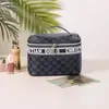 Nova Bolsa de Cosméticos Portátil Coreana Dividida Bolsa de Armazenamento Feminina Grande Capacidade Portátil de Viagem Bolsa de Cosméticos de Alto Padrão Venda por Atacado