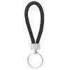 Llavero creativo de cuerda de cuero tejido con forma de punto, llavero colgante de cuero sintético para coche, llavero para empujar, pequeños regalos, fabricantes al por mayor