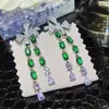 Pendientes de mariposa y flor de circón verde ultrabrillante transfronterizos, sensación de lujo ligero de alta gama, pendientes versátiles con un diseño único