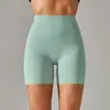 Pantalones de yoga de estilo nuevo sin línea de vergüenza color piel para mujer, cintura alta, realce de glúteos, compresión abdominal, shorts deportivos de tres puntos