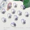 Nuevos accesorios para uñas Joker viento ins morado grisáceo flores pequeñas tridimensionales luminosas mixtas accesorios para usar al por mayor