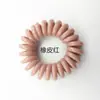 Línea telefónica mediana Muelle 3.8 diámetro línea telefónica plástico pelo Anillo niños color caramelo accesorios para el cabello fabricantes al por mayor