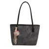 Bolso Tote Casual de Moda de Gran Capacidad para Mujer 2025 Primavera Nuevo Bolso de Hombro Simple Versátil para el Trabajo y los Viajes Bolso de Mujer
