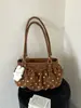 Bolso de hombro y axila con diseño único de lunares plisados para mujer, nuevo bolso de moda de verano 2026 de doble uso para el trabajo y los desplazamientos