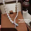 Joia Xinghe Brilhante Passe-partout Colar Fugui Ponto Charmoso Broca Cruz Escovada Anel de Zircônia conjunto