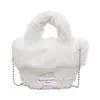 Bolsa de mão de pelúcia de lã de cordeiro de alta moda para outono e inverno para mulheres, nova bolsa transversal e de ombro peluda da moda