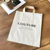 Tienda de Ropa de Alta Costura Ropa Infantil Bolsas de Plástico Gruesas Bolsas Tote para Regalo de Vacaciones en Supermercado Al por Mayor en Stock