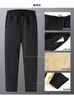 Pantalones largos casuales sueltos para hombre, gruesos, con forro polar cálido, resistentes al viento e impermeables, pantalones de algodón para uso en exteriores, pantalones deportivos de lana de cordero