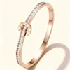 Pulsera trenzada de acero inoxidable con hebilla de herradura estilo europeo y americano, simple y moderna, pulsera ajustable de acero de titanio, pulsera de alambre de acero