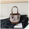Bolsa transversal Shuai Mijia 2026 nova e estilosa de bolinhas para mulheres, bolsa de ombro de grande capacidade, bolsa tote estilo balde de alta estética