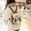 Mochila Fofa com Orelhas de Coelho Bolsa Pequena 2026 Novo Design Bolsa de Mão Versátil Mochila Pequena Patchwork Quadriculada para Mulheres