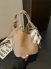 Bolso de mano de diseño de nicho de alta gama nuevo 2026 para mujer, bolso cruzado versátil de moda para el día a día, cesta tote, bolso cubo