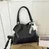 Bolso tote europeo y americano de gran capacidad transfronterizo, bolso de hombro de moda para llevar debajo del brazo, bolso de mano de nicho único y elegante