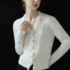Gang Mi Apparel / 2026 Elegante Encaje Cuello en V Botón Dorado Ajustado Estilo Little Xiang Cárdigan de Punto de Lana Pura Corto
