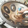 Tambor de disco de mano al por mayor transfronterizo para suministro primario transfronterizo nacional y extranjero fábrica de origen de instrumento musical Handpan Lu Ming