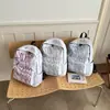 Fábrica de origen de comercio exterior estilo coreano graffiti nailon gran capacidad casual deportivo moderno mochila para estudiantes de secundaria