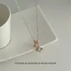 Exquisito Collar con Colgante de Flor de Cuatro Hojas Hueca con Microincrustaciones de Circonita, Cadena para Clavícula Versátil de Lujo Ligero de Nicho
