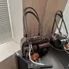 Bolso tipo almohada transfronterizo para mujer 2026 Nuevo estilo Bolso de axila Tacto de alta gama Bolso de mano para hombro Versátil Bolso para ir al trabajo Bolso de boliche
