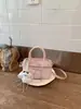Bolsa de luxo de nicho estilo coreano para mulheres, nova moda primavera 2026, versátil, com textura, de ombro e transversal