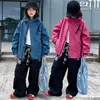Cortavientos con capucha para niñas de otoño 2026 nuevo estilo chaqueta de primavera y otoño de moda para niños mayores cortavientos tres-prueba para exteriores