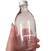 Bebida de Vino de Frutas Reenvasada Botella Sellada con Tapa 330ml Botella de Agua Mineral Botella de Café Cold Brew Botella de Savia de Abedul Botella de Vidrio