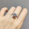 Anillo abierto chapado en platino pt950 con simulación de moissanita incrustado con ocho corazones y ocho flechas de imitación de diamante Anillo de bufanda de moda neta para mujer