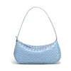 Bolsa Baguette de Venta Caliente Europea y Americana Moda Bolso de Hombro Único Debajo del Brazo Color Sólido Cuero Suave Tejido Bolso para Mujer Cruzado Bolso Dumpling Moderno