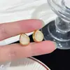 Aretes de Ojo de Gato Transparente con Baño de Oro Real, Diseño Simple de Lujo Ligero, Aretes Reversibles en Forma de Gota de Agua