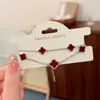 Pulsera de Flor de Cuatro Hojas con Microincrustaciones de Circonita de Doble Capa Versátil de Lujo Ligero Estilo Coreano con Diseño Único de Nicho y Joyería de Moda