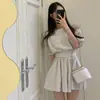 Tallas Actualizadas Chic Coreano Nicho Top de Cuello Redondo con Manga Abullonada + Conjunto de Falda Corta Plisada Casual Ropa para Mujer